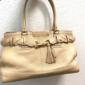 Cream/beige Coach handbag.